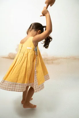 Old photographs sleeveless layered pinafore dress in yellow handwoven cotton